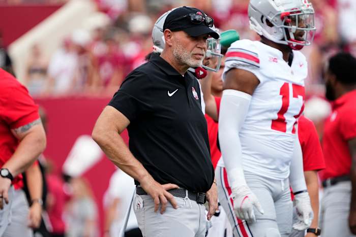 Ohio State Buckeyes defensive coordinator Jim Knowles watches warm ups prior to the NCAA football game at Indiana University Memorial Stadium. Ohio State won 23-3
